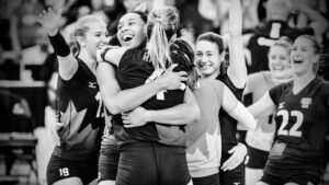 volleyball team hugging