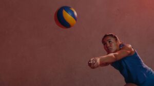 Woman hitting volleyball