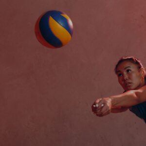 Woman hitting volleyball