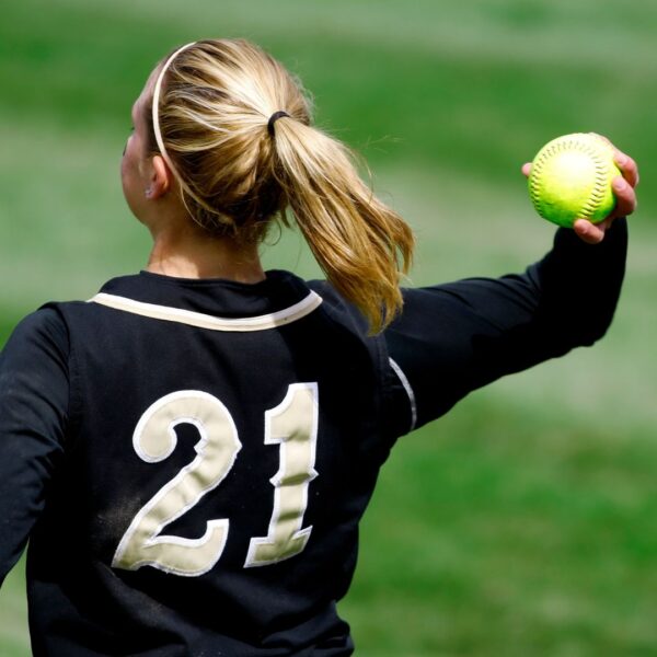 softball ball player throwing